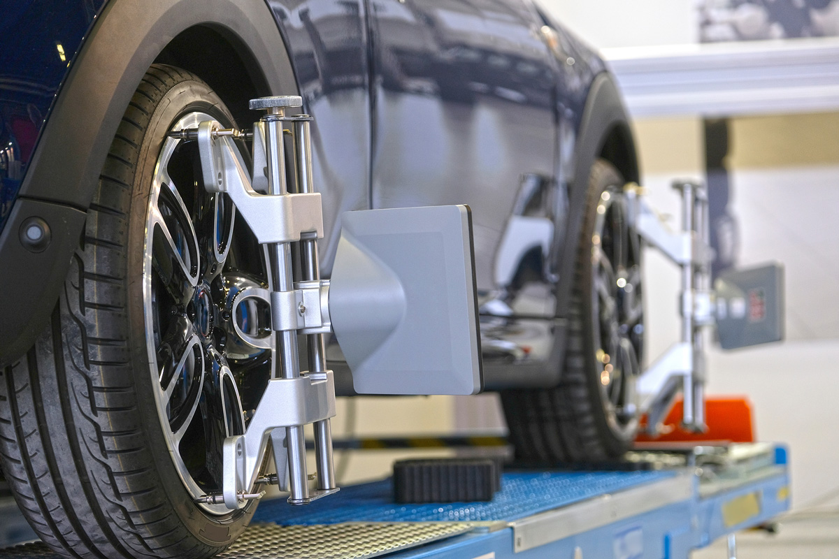 A car getting a wheel alignment performed in El Paso.