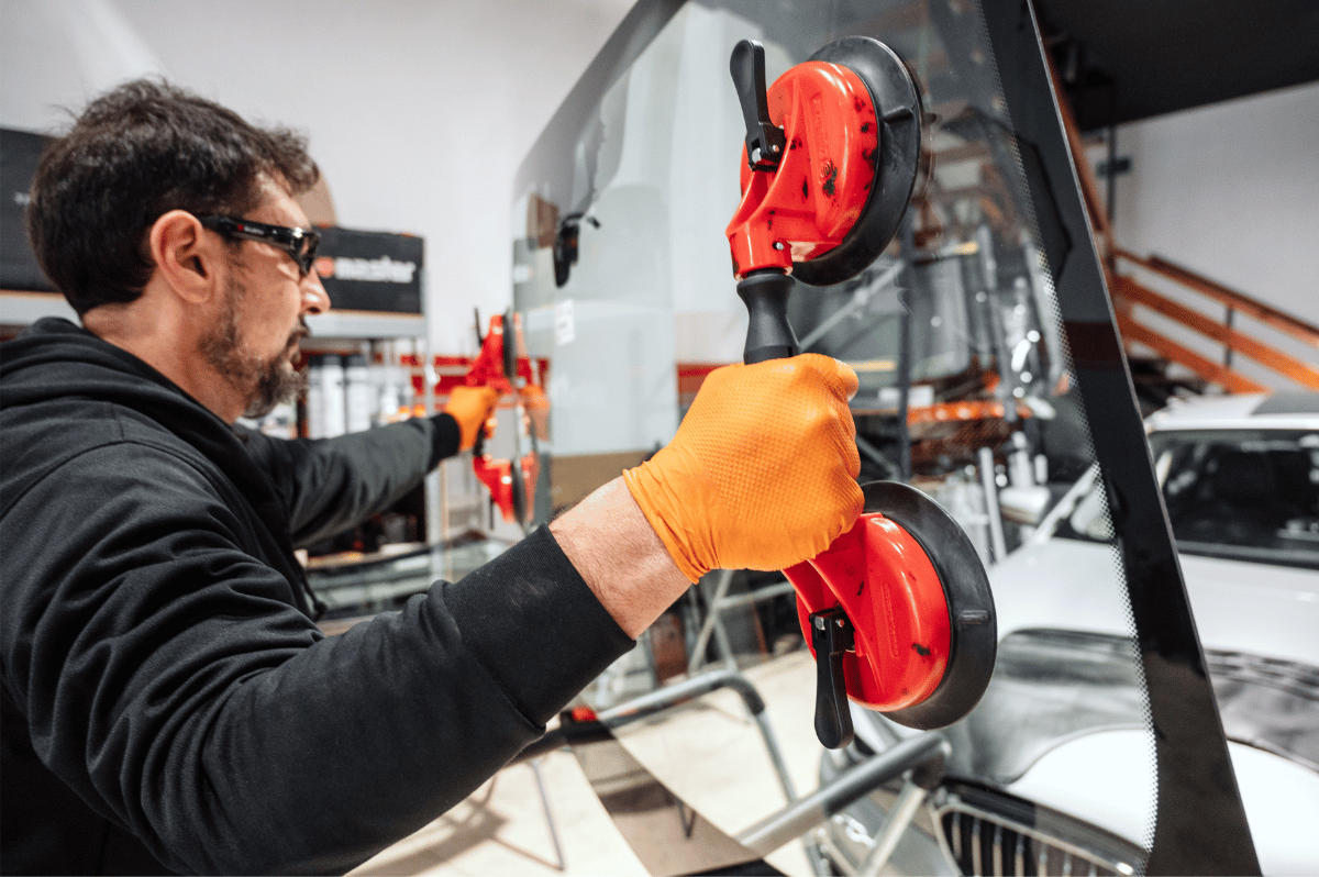 An auto glass repair technician
